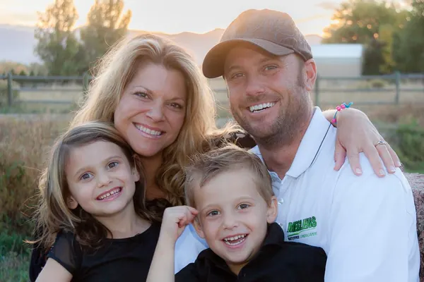 Chris Meglen, owner of Meglen's Waterwise Landscapes, with his family